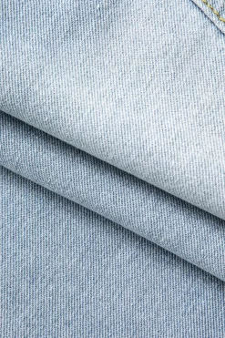 MICAS Skirts-Asymmetrical Frayed Hem Slit Denim Midi Skirt LIGHT WASH BLUE