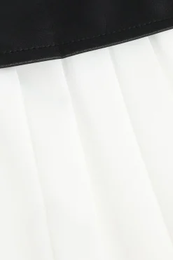 MICAS Skirts-Contrast Pleated Faux Leather Midi Skirt